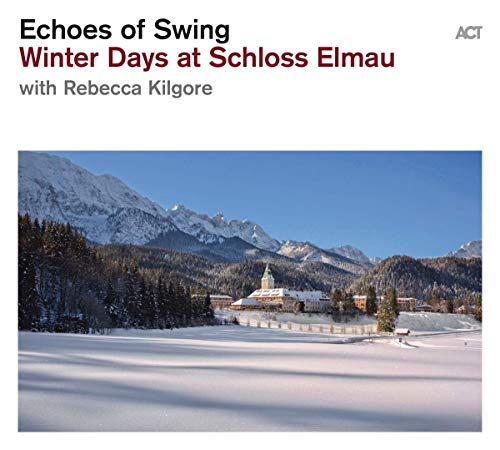 CD cover with snowy mountains, a building, and winter landscape.