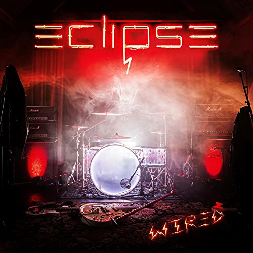“Eclipse - Wired” CD cover with a drum kit, amps, and neon lighting.