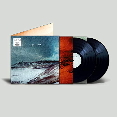 "Double vinyl record with abstract landscape cover, partially open to reveal black discs."