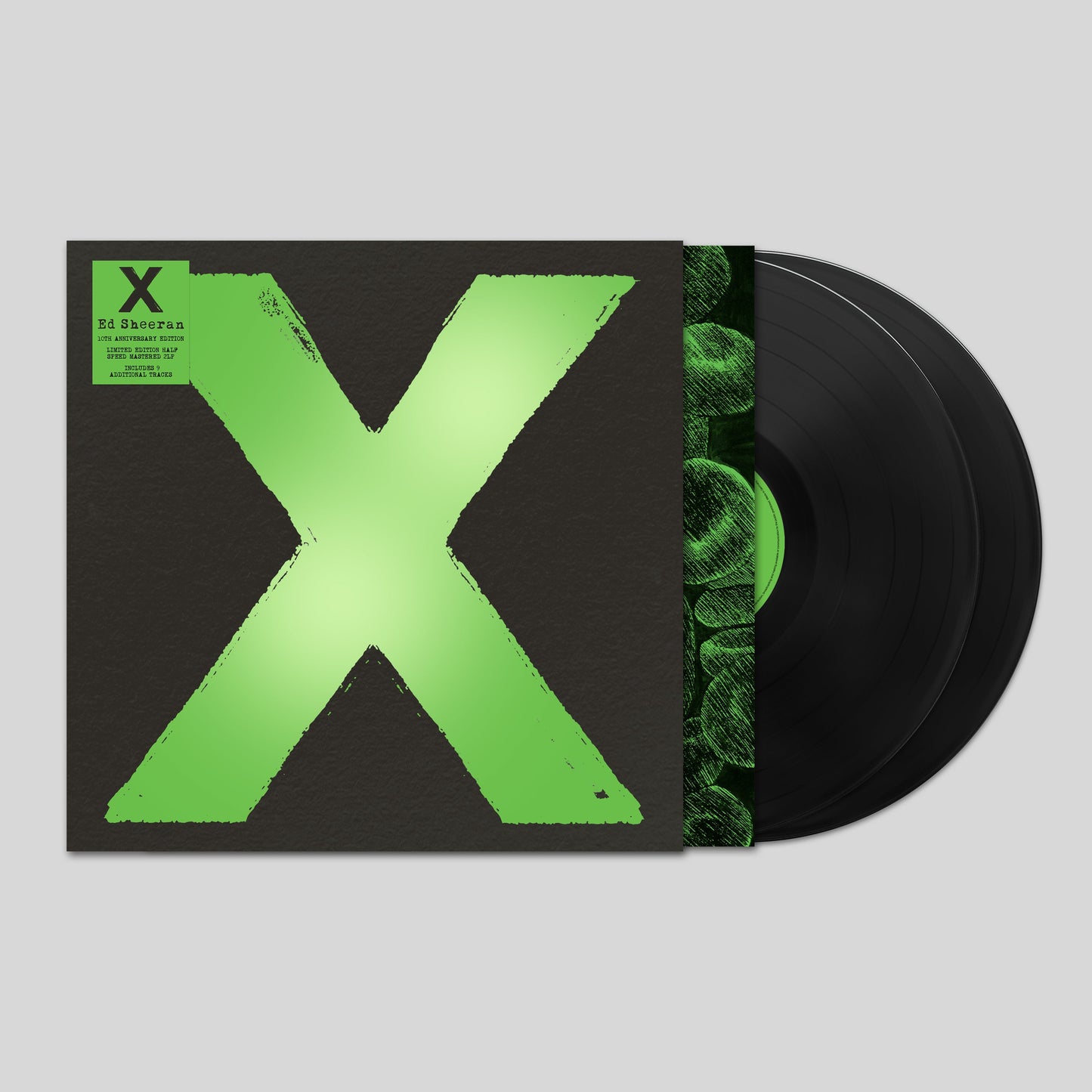 Ed Sheeran “x” vinyl record with a large green “X” on a black background.