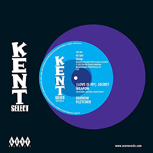 A vinyl record with a blue label and purple outer ring on a black background.