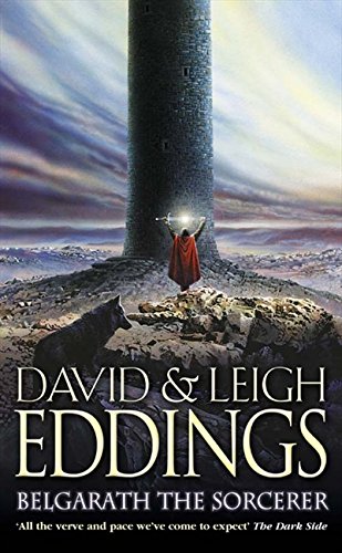 Book cover: sorcerer before a tall tower, with a wolf in foreground.