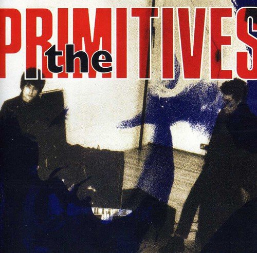 "Album cover with two men and bold red text reading 'the primitives'."