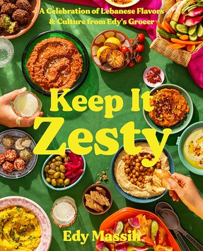 Overhead view of various Lebanese dishes on a green tablecloth with cookbook title text.