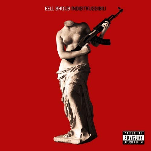 Red album cover featuring a statue holding an assault rifle.