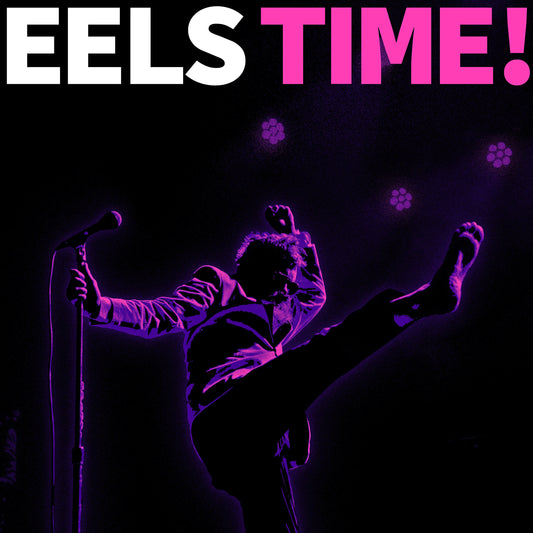 Album cover featuring a silhouette of a man kicking on stage with purple lighting.