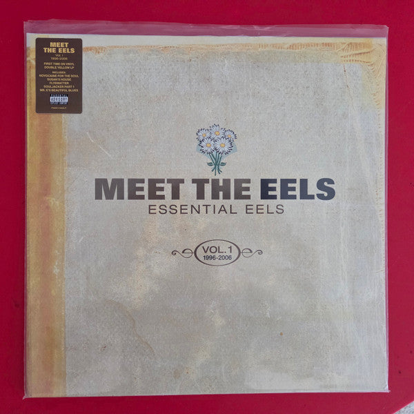 Meet The Eels" vinyl record cover with floral illustration and text.
