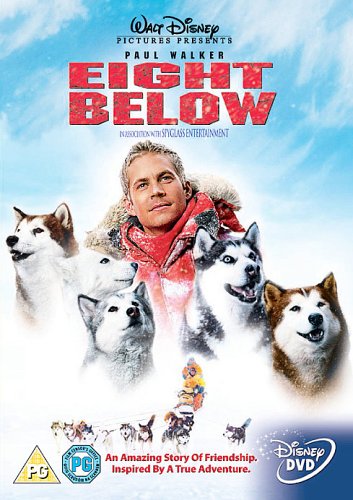 DVD cover for Eight Below featuring Paul Walker surrounded by several sled dogs.