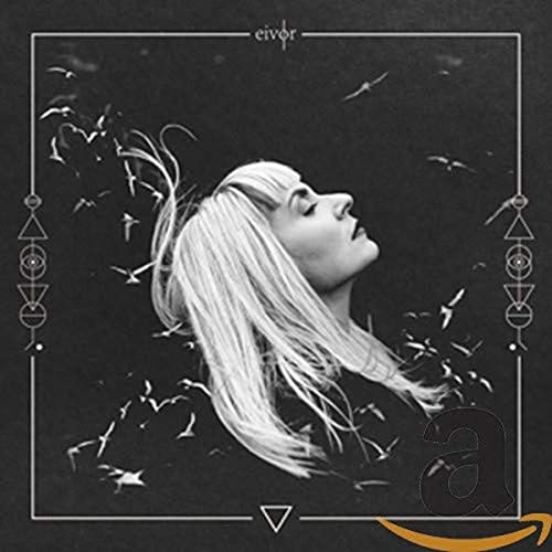 Black and white album cover featuring a woman with long blonde hair, birds flying.