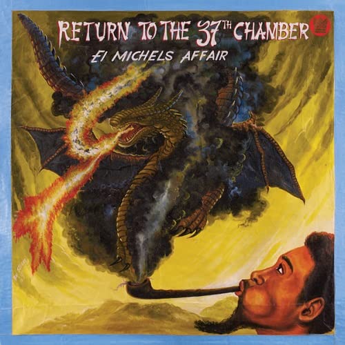Album cover: dragon, smoke, and a man’s face in profile.