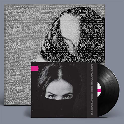 Black vinyl record and album cover featuring a striking portrait of Ela Minus.