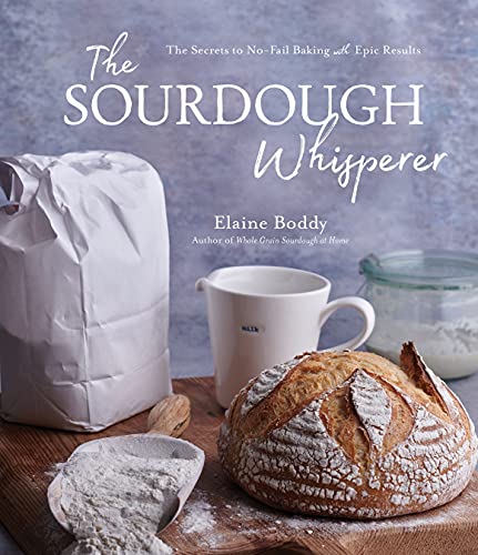 Book cover featuring a loaf of sourdough bread, flour, and a milk jug.