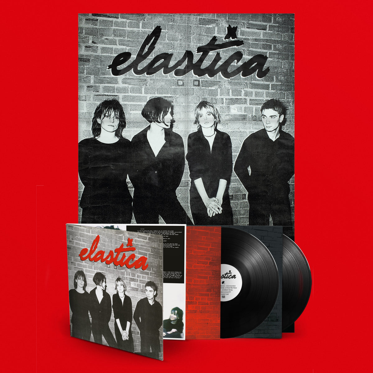 Elastica album cover and vinyl record on a red background.
