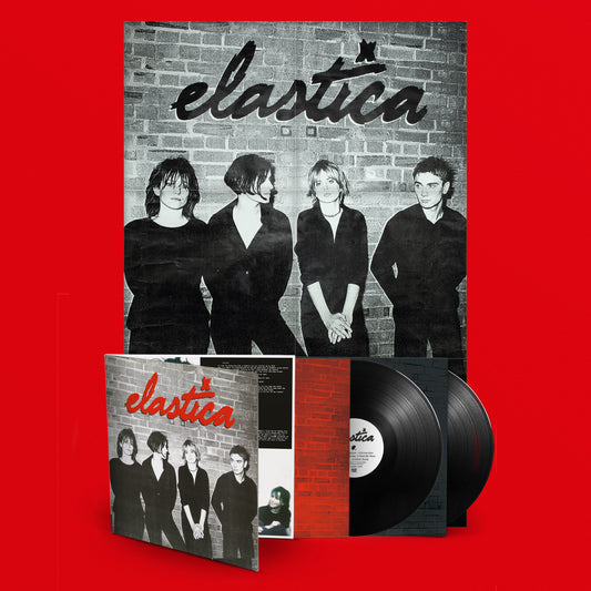 Elastica album cover and vinyl record on a red background.