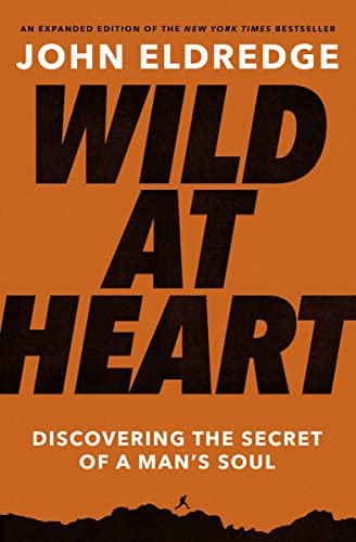 Book cover: "Wild at Heart" by John Eldredge, orange and black design.