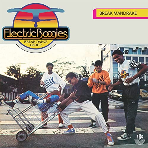 Album cover: Four men in 80s street style performing breakdance moves.