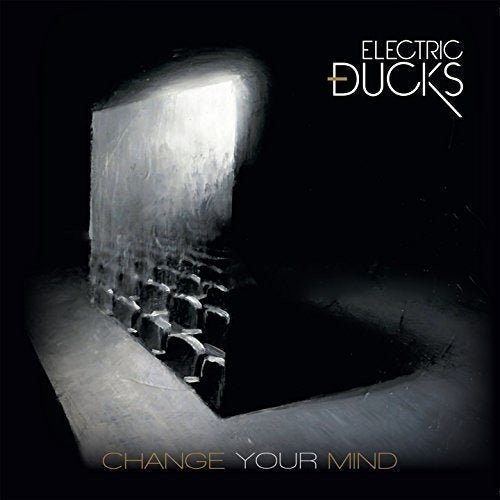 CD cover for Electric Ducks’ “Change Your Mind” with a stark, lit hallway.