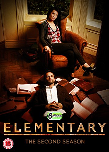 Elementary" Season 2 DVD cover with two actors surrounded by open books.