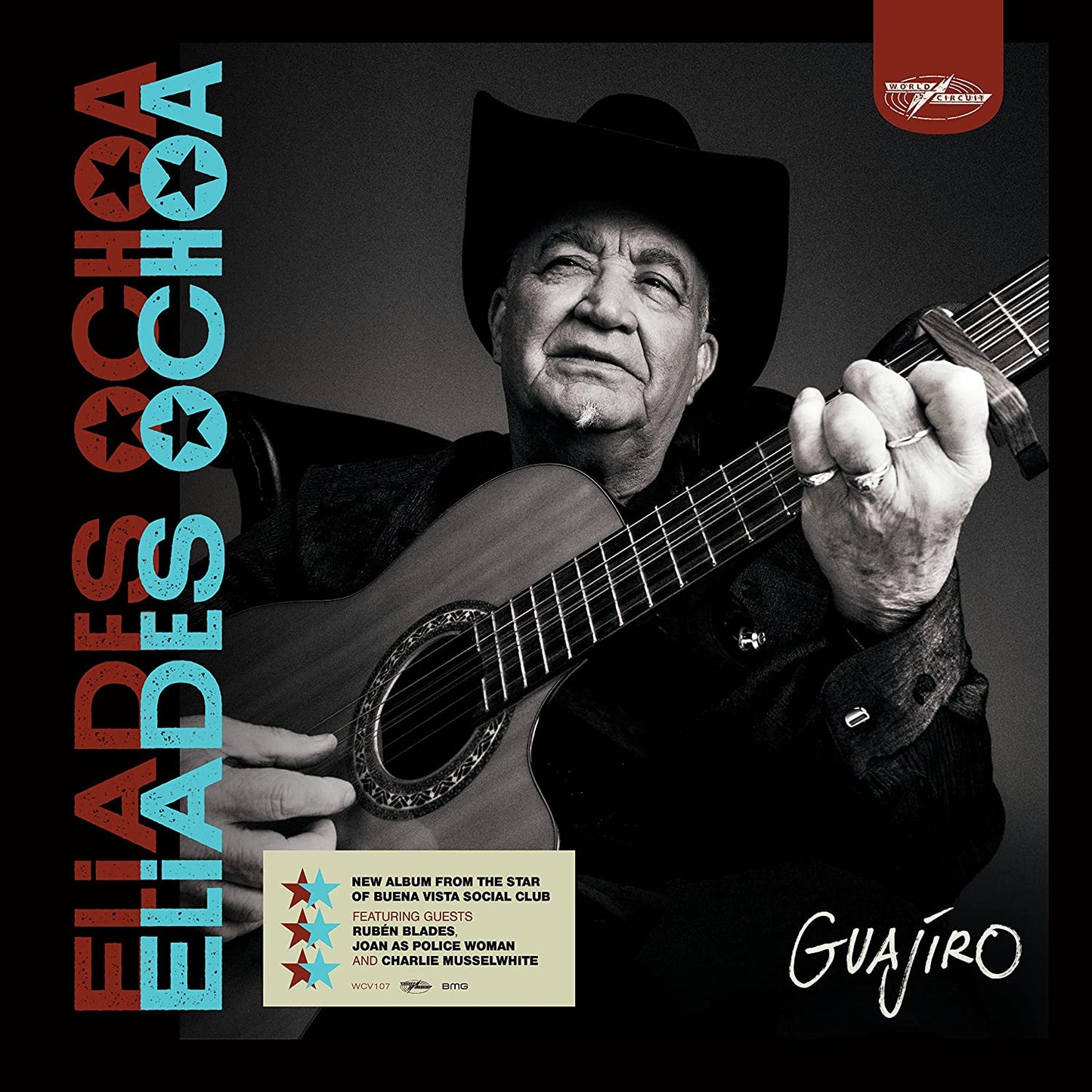 Man in cowboy hat holding guitar on album cover with colorful text and logo.