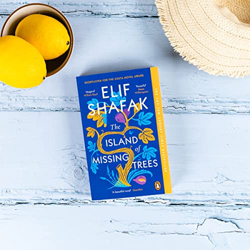 Book cover, “The Island of Missing Trees” by Elif Shafak, with lemons and a hat.