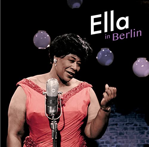 Ella Fitzgerald singing into a vintage microphone on album cover.