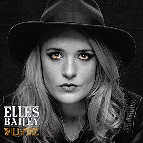 Elles Bailey album cover: woman in a hat, direct gaze.
