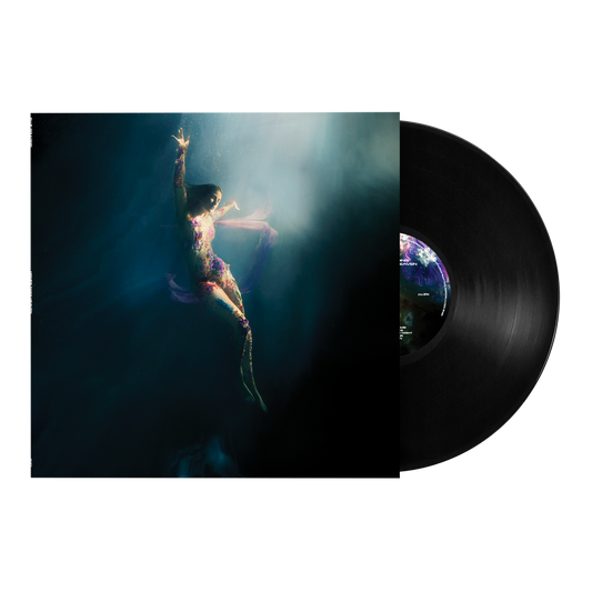 Ellie Goulding’s “Higher Than Heaven” vinyl record with underwater album art.