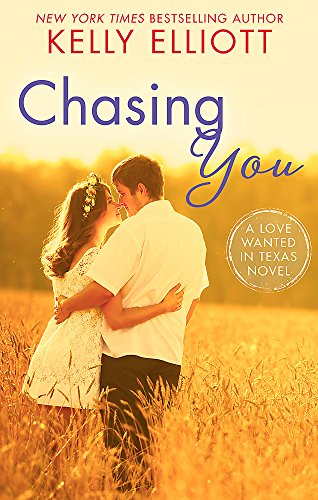 Couple embracing in a wheat field, book cover for "Chasing You.