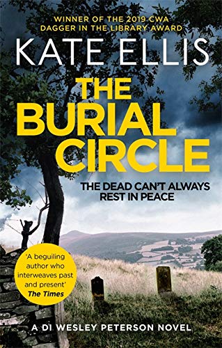 Book cover showing headstones in a grassy field against a stormy sky.