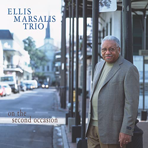 CD cover featuring Ellis Marsalis, a jazz pianist, in a city street.