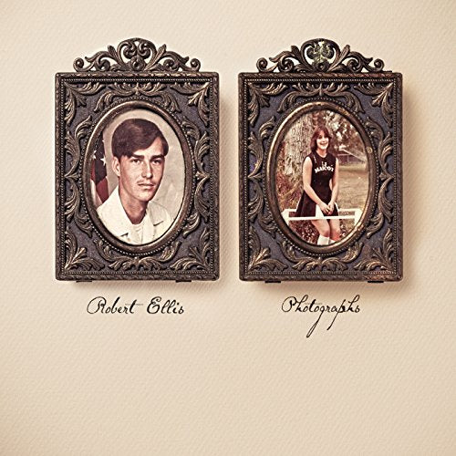 CD cover with two vintage portraits in ornate frames.