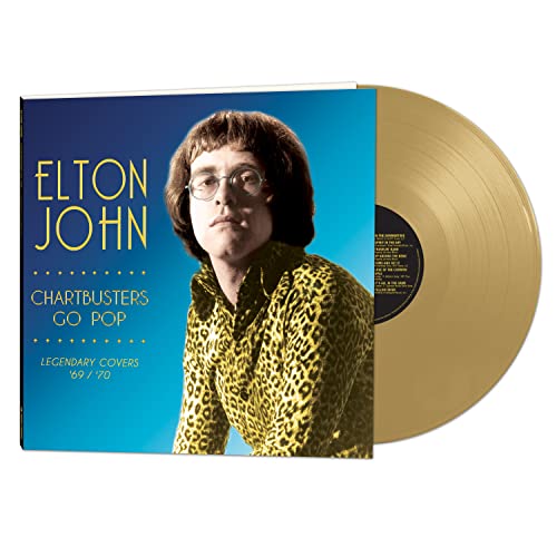 Elton John album cover and gold vinyl record on white background.