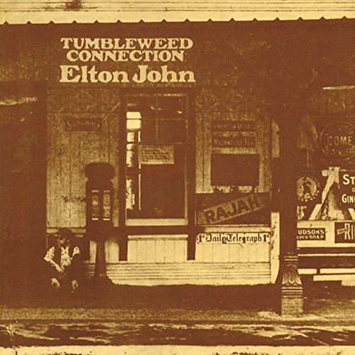 Sepia-toned album cover for Elton John’s “Tumbleweed Connection” featuring a storefront.