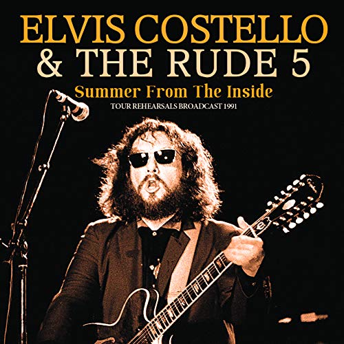 Elvis Costello with guitar, wearing sunglasses, on a CD cover.