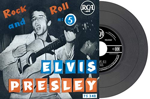 Elvis Presley album cover featuring a young Elvis with a guitar.