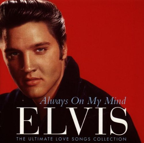 Portrait of Elvis Presley on album cover, red background, white text.