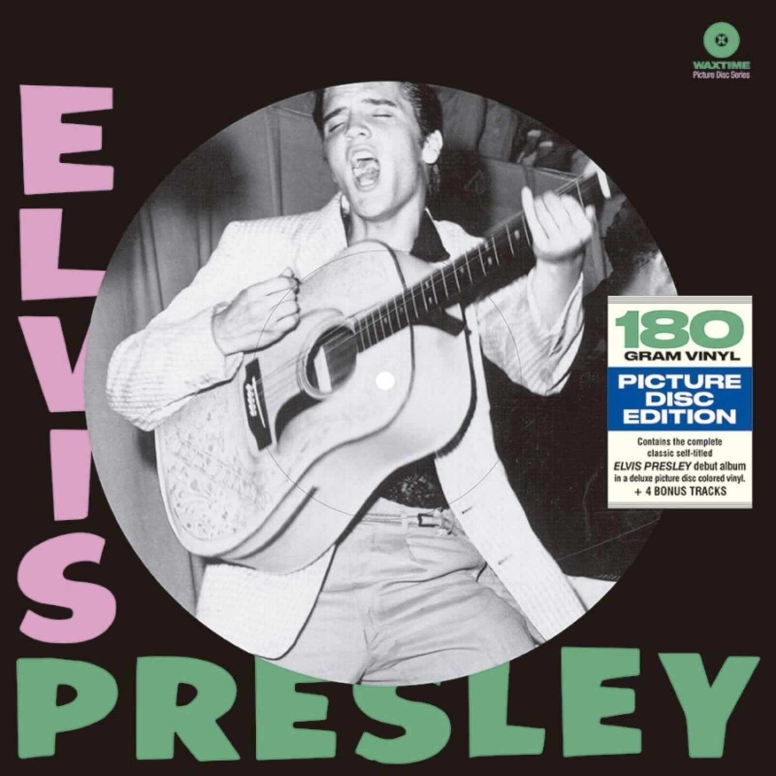 Elvis Presley album cover featuring a black and white photo of him with a guitar.