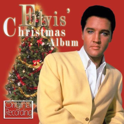 "Elvis Presley's Christmas Album cover featuring Elvis in a yellow suit beside a Christmas tree."