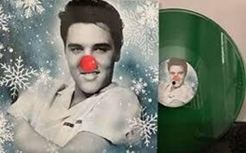 Elvis Presley Christmas album on green vinyl with a festive cover.