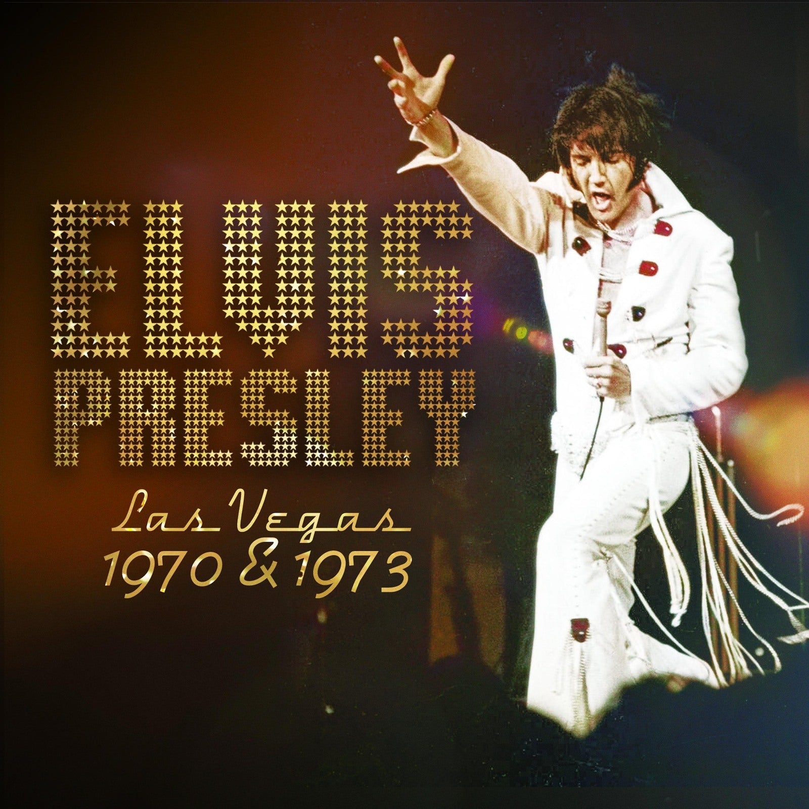 Elvis Presley album cover featuring a performing Elvis in a white suit.