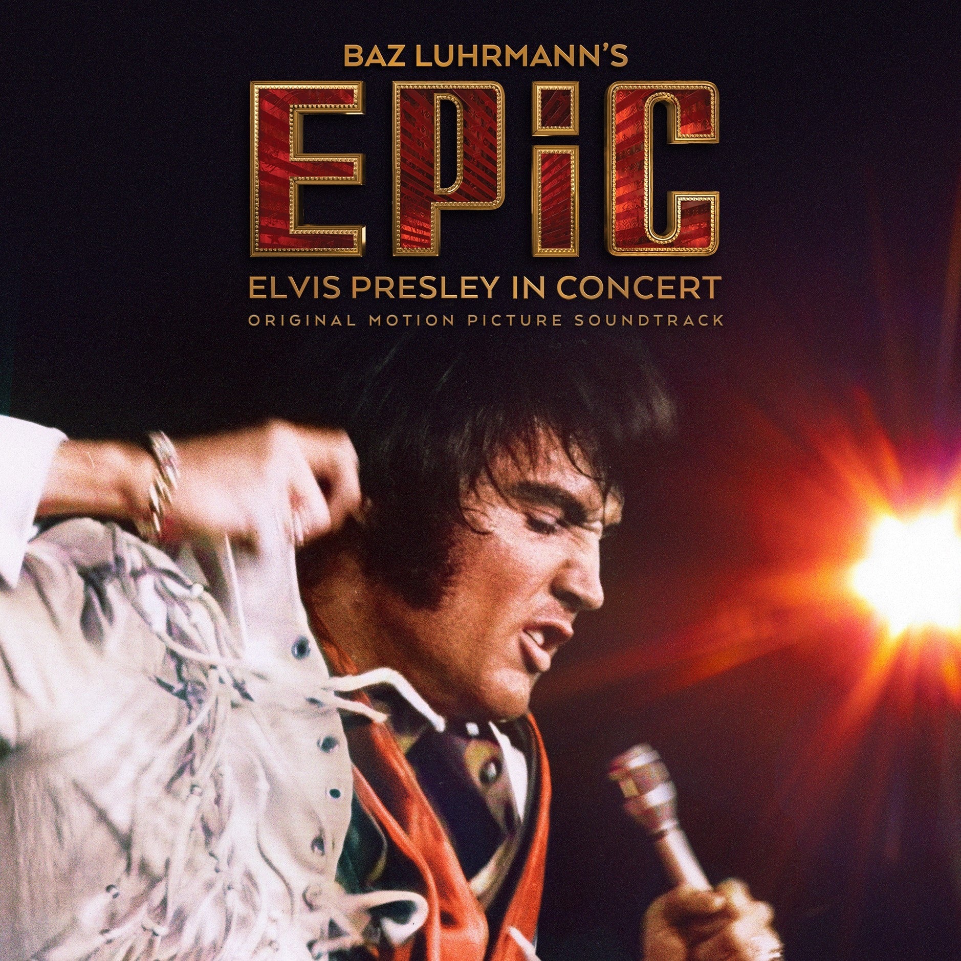 Elvis Presley concert album cover with a dramatic stage light effect.