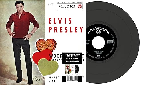 Elvis Presley vinyl record with cover featuring a red shirt and hearts.