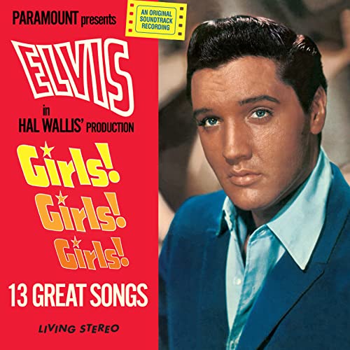 Red vinyl record cover featuring Elvis Presley in a blue suit.