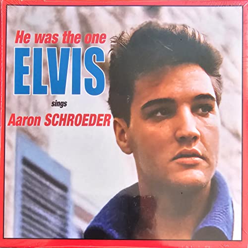 Close-up of young Elvis Presley on a red and blue album cover.