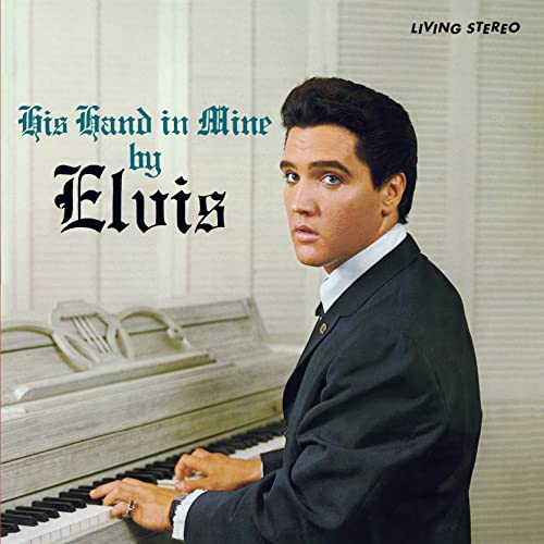Elvis Presley sitting at a piano on the His Hand in Mine album cover.