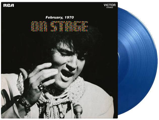 Elvis Presley “On Stage” blue vinyl record with black cover art.