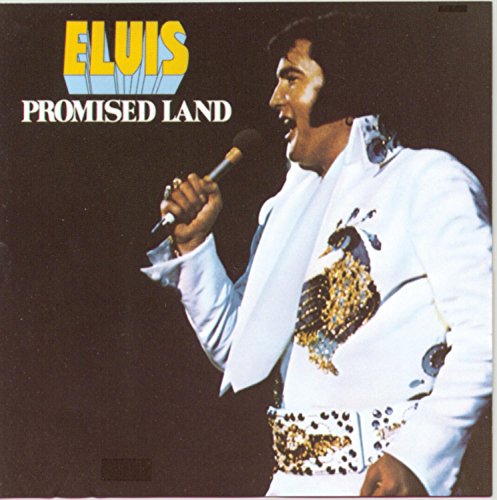 Elvis Presley album cover, "Promised Land," featuring him singing into a microphone.