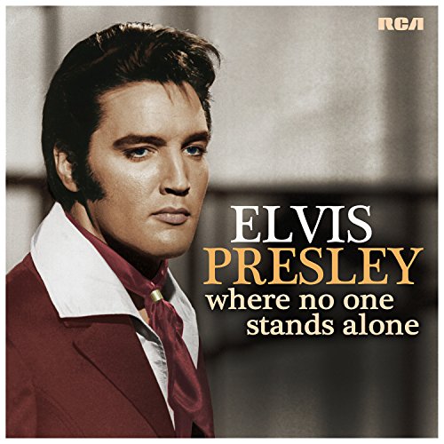 CD cover featuring a portrait of Elvis Presley in a red suit.