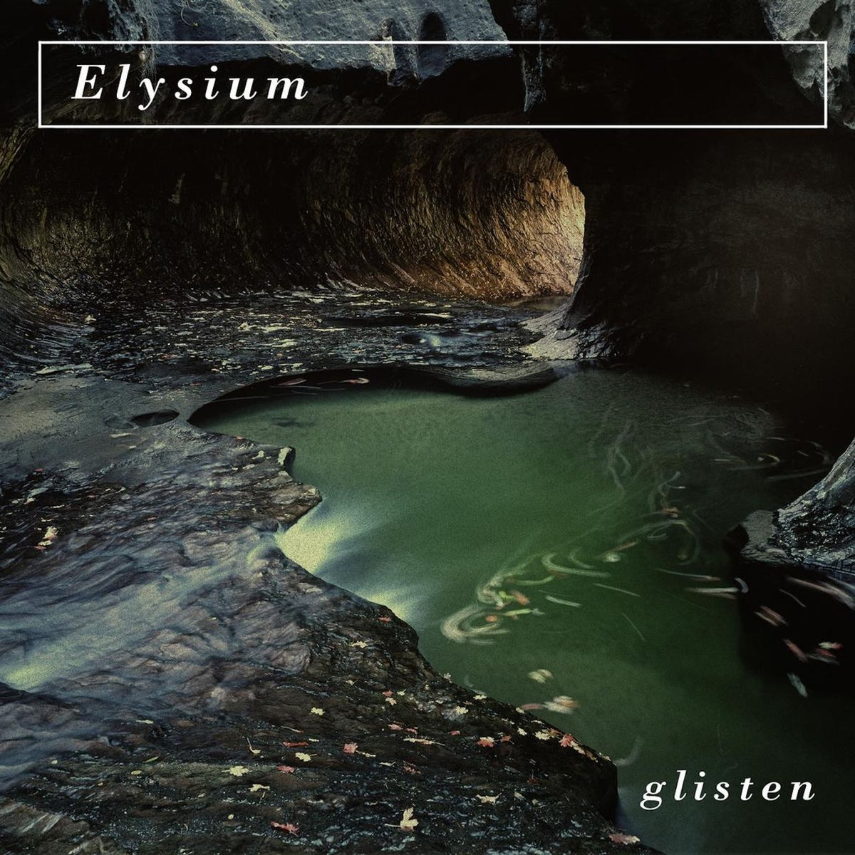 CD cover for Elysium’s “Glisten” featuring a dark, textured landscape.