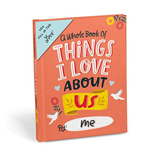 Orange fill-in-the-blank book with hand-drawn hearts, flowers, and birds.